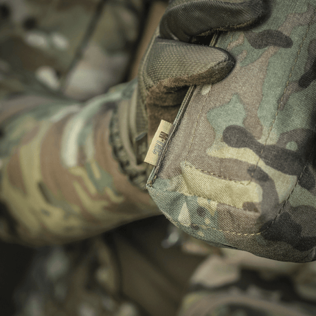 M-Tac Mediclomme Small Vertical Elite kulutusta kestävästä multicam-nylonista NIJ-sertifioinnilla ja integroidulla IFAK-organizerilla, näytetty gallerian sijainti 1.