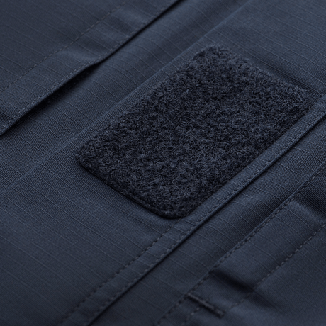 Detalje af M-Tac Jakke Patrol Flex med velcro-panel på brystlomme, designet til praktisk taktisk brug.