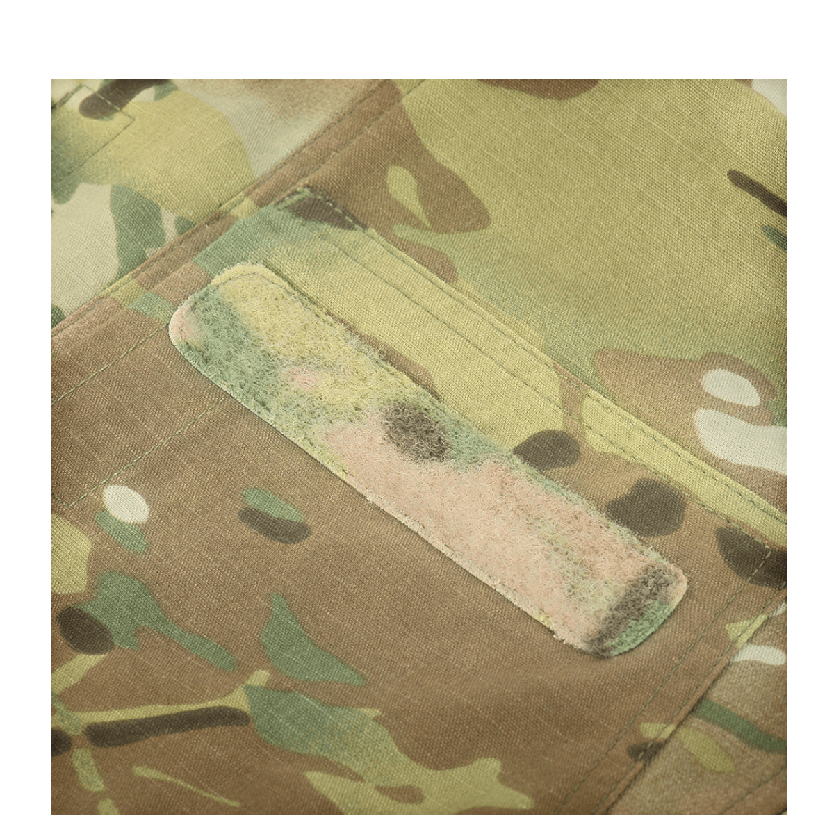 Detalje af M-Tac Feltjakke NYCO Extreme med Multicam-mønster og slidstærkt amerikansk NYCO Extreme-stof.
