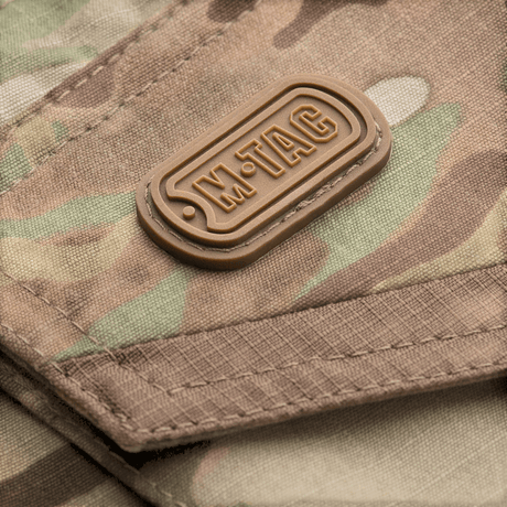 M-Tac Bukser Aggressor Elite NYCO multicam med slidstærkt nylon-bomuldsmateriale og M-Tac gummilogo, gallery position 1.