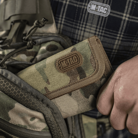 M-Tac Pung Elite Gen.II maastokuvioisena ja kestävä Cordura 500D-materiaalina, sopii korteille, seteleille ja asiakirjoille. Tyylikäs M-Tac-logo.