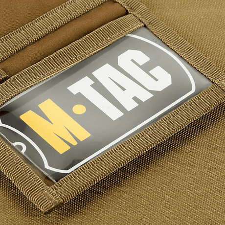 M-Tac Pung Elite Gen.II Cordura 500D-rakenteella ja YKK-vetoketjuilla, korostaa tukevaa ja tyylikästä muotoilua logolla.