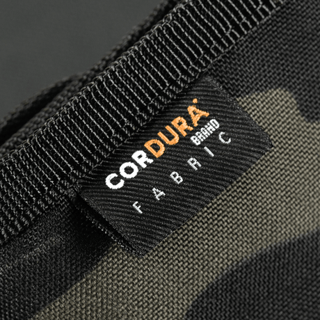 Lähikuva M-Tac Pung Elite Gen.II:stä, valmistettu kestävästä Cordura 500D-kankaasta, Cordura-merkki kankaassa.