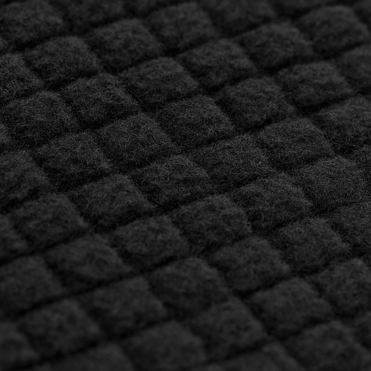 Nærbillede af M-Tac Delta Level 2 Fleece Bukser med blød og varm polyester struktur.