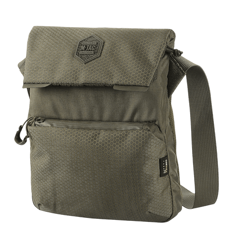 M-Tac Konvert Taske Elite kestävästä Cordura-materiaalista, säädettävä olkahihna ja magnetventil nopeaan pääsyyn.