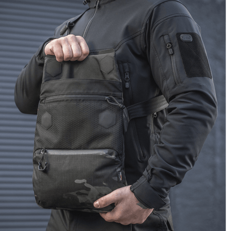 M-Tac Konvert Taske Elite mustana, magneettikannella, Cordura-materiaali ja säädettävä olkahihna. Sopii tabletille.