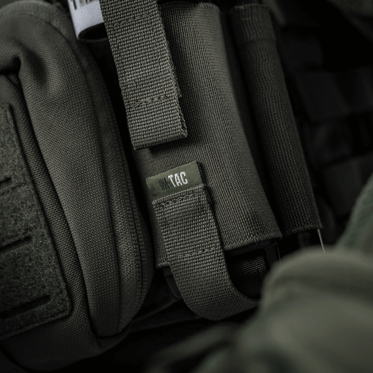 M-Tac Elastisk Tourniquet Holder Gen. III i slidstærkt Cordura 500D med bred elastik og Texcel-webbing for sikker pasform.
