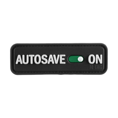 M-Tac Patch Autosave PVC 3D-muotoilulla ja Velcro-takapuolella, musta suorakulmio 'Autosave On' -tekstillä, sopii taktiseen varustukseen.