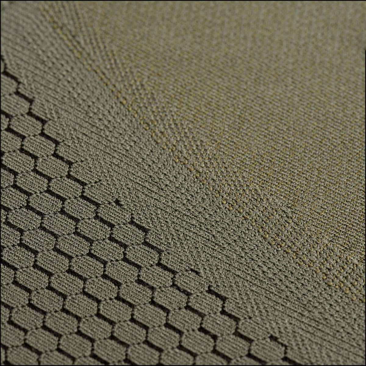 Close-up af materialet fra M-Tac Hexagon Sports Underbukser med unikt sekskantet mønster. Komfort og ydeevne for sportsentusiaster.