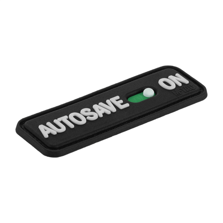 M-Tac Patch Autosave PVC 3D-efektillä ja Velcro-kiinnityksellä, sopii vaatteisiin ja varusteisiin. Mitat 8 x 2.5 cm, valmistettu PVC:stä.