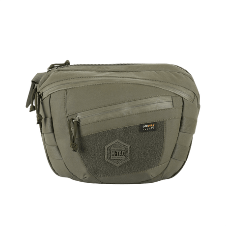 M-Tac Sphaera Hardsling Bag Large Elite med Velcro oliivinvihreänä, etu-Velcro-paneelilla ja säädettävällä olkahihnalla, valmistettu kulutusta kestävästä Cordura:sta.