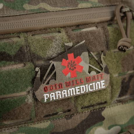 M-Tac Patch Viking Evac, jossa viikinkivene ja "Odin Will Wait Paramedicine" -teksti maastotaustalla.