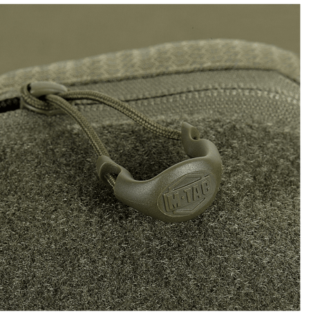 M-Tac Bat Wing Taske Elite Hex lähikuvassa, YKK-vetoketjuilla ja kestävästä Cordura-materiaalista.
