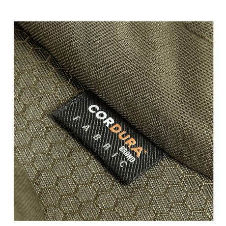 Lähikuva M-Tac Bat Wing Taske Elite Hexistä, vahva Cordura Hex -kangas vihreänä tekstuurilla, korostaa kestävyyttä.