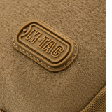 M-Tac Carry Sling Taske Elite Gen.IV med Velcro i sandfarvet design med synligt M-Tac logo på tekstur. Skuldertaske med velcro-funktion.