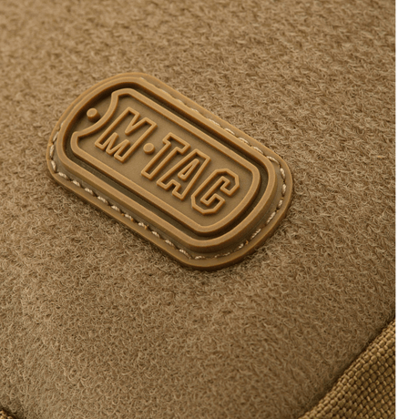 M-Tac Carry Sling Taske Elite Gen.IV med Velcro i sandfarvet design med synligt M-Tac logo på tekstur. Skuldertaske med velcro-funktion.