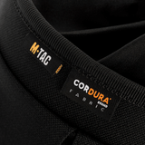 M-Tac Mag Drop Pouch Elite lavet af slidstærkt CORDURA stof med MOLLE-fastgørelser til hurtig magasinudskiftning.