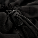 Nærbillede af M-Tac Mag Drop Pouch Elite med hurtig-udløsningssystem, der demonstrerer taskens sikkerhed og funktionalitet.