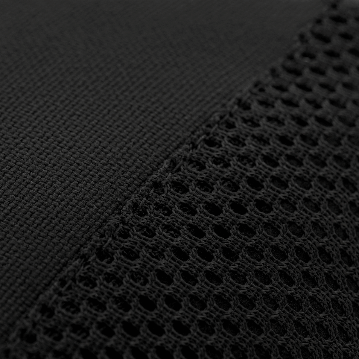 Nærbillede af M-Tac Mag Drop Pouch Elite stofdetalje med netstruktur for sikker magasinopbevaring.