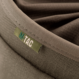 Nærbillede af M-Tac Mag Drop Pouch Elite med fokus på det robuste stof og M-Tac logoet. Designet til sikker magasinopbevaring med MOLLE-fastgørelser.