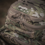 Detaljer af M-Tac Rygsæk Large Gen.IV Elite i camo-design med robuste lynlåse, fremstillet af slidstærk Cordura for holdbarhed.