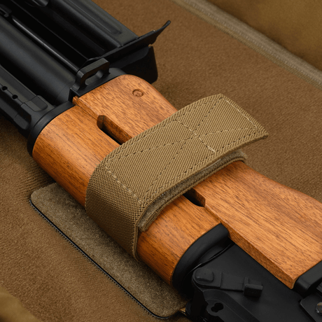Nærbillede af våbenrem i M-Tac Gun Backpack Case 125 cm Gen.II Elite fremstillet i robust materiale til sikker transport.