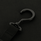 Sort krog på M-Tac Toilettaske Elite Gen.II i nærbillede, viser detaljeret design af hængemekanisme på toilettasken.