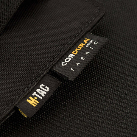 M-Tac Double Mag Pouch Hook Backed Magazine med Cordura mærkeetiket, designet til at transportere to pistolmagasiner og lignende genstande.