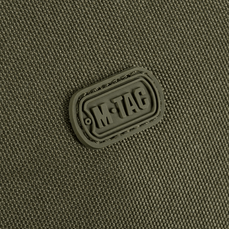 M-Tac Toilettaske i vandafvisende 600D polyester med PVC-belægning, ideel til rejser og hverdagsbrug. Kompakt og praktisk design.