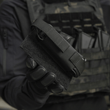 M-Tac Tourniquet Pouch Elastisk VELCRO Gen.II i brug på taktisk vest med Cordura 500D materiale og Texcel-seler.