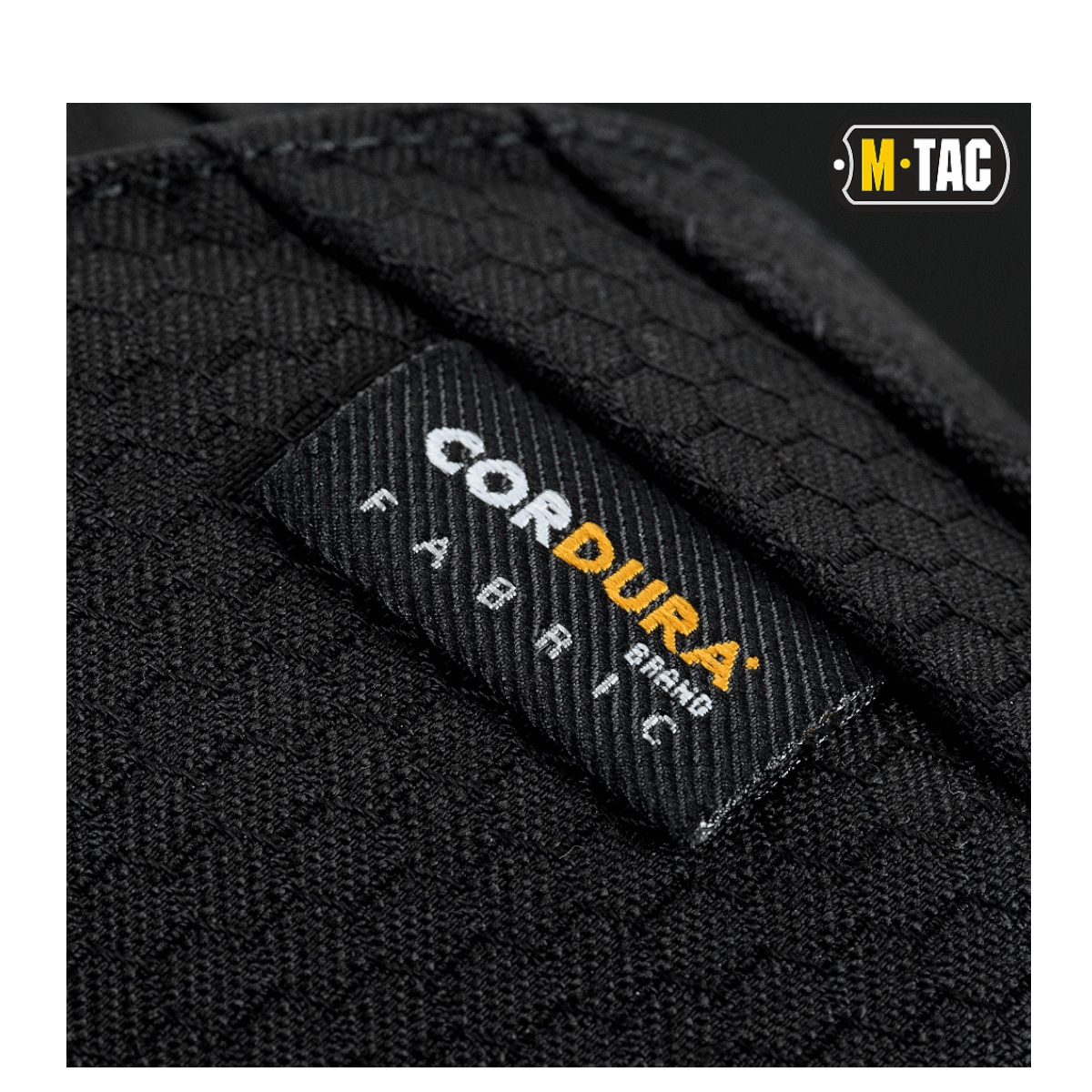 Nærbillede af M-Tac Magnet XL Taske Elite Hex, viser Cordura-stofdetaljer og M-TAC-logoet.