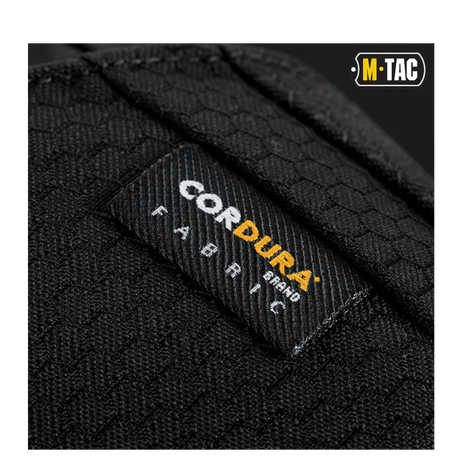 Nærbillede af M-Tac Magnet XL Taske Elite Hex, viser Cordura-stofdetaljer og M-TAC-logoet.