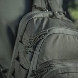 Nærbillede af M‑Tac Cross Bag Elite Hex med Cordura 500 materiale og YKK lynlåse, perfekt til daglig brug og taktiske formål.