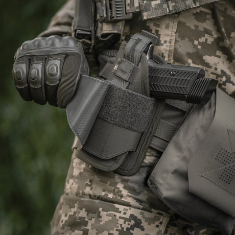 M-Tac Universal Taktisk Hylster Elite Venstre med pistolfastholdelse og MOLLE-interface.