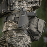 M-Tac Universal Taktisk Hylster Elite Venstre monteret på bælte med MOLLE-interface og Glock pistol, fremstillet af Cordura 500D.