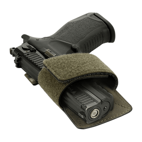 M-Tac Hylster-Insert Light til skjult bæring af pistoler med justerbar velcrostrop, ideel til taktiske tasker med velcro-panel.