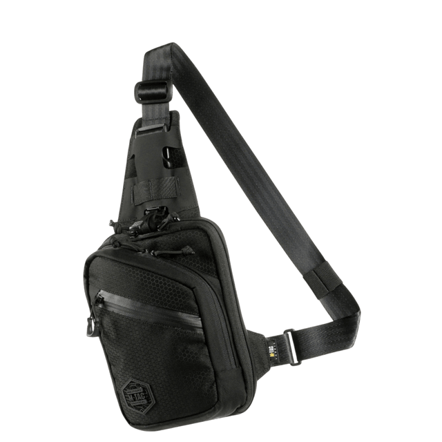M-Tac Sling Pistoltaske Elite Hex i sort Cordura 1000D med justerbar skulderrem og fire rum, stilfuld og holdbar taske til skjult våben.