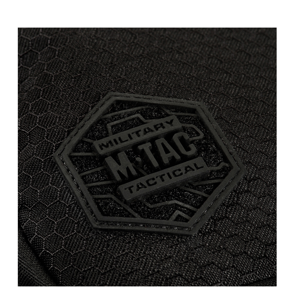 M-Tac Sling Pistoltaske Elite Hex med holdbart Cordura materiale og M.Tac logo på taskens overflade.