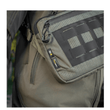 M-Tac Admin Taske Elite lavet af slidstærkt Cordura-materiale med justerbar skulderrem og YKK lynlåse for stilfuld funktionalitet.