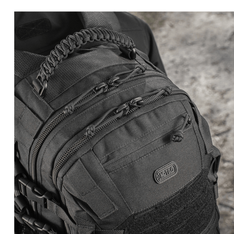 M-Tac Mission Pack Elite rygsæk med slidstærkt Cordura 1000D materiale og MOLLE LASER CUT-system detalje, set tæt på.
