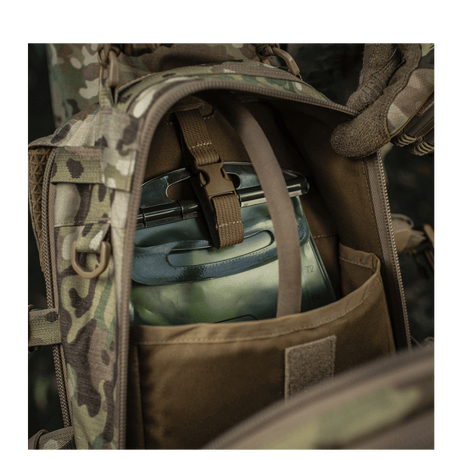 Detaljeret billede af M-Tac Mission Pack Elite med MOLLE LASER CUT-system og slidstærk Cordura 1000D. Ergonomisk og stilfuld rygsæk.
