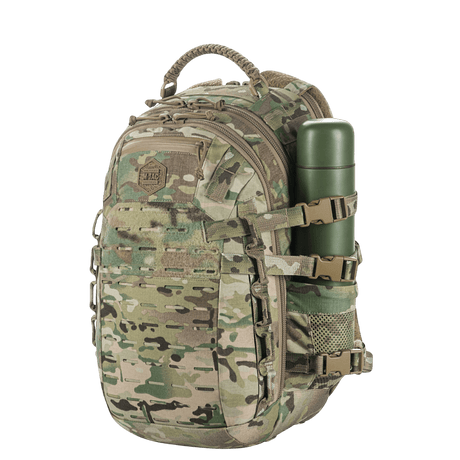 M-Tac Mission Pack Elite rygsæk i camouflagemønster med slidstærk Cordura 1000D og MOLLE LASER CUT-system til øget funktionalitet.