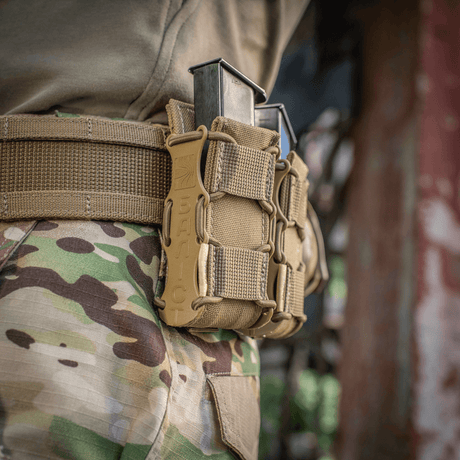 M-Tac Pistolmagasinlomme Kolchan monteret på bælte med magasiner, lavet af holdbar Cordura 1000D, designet til hurtig adgang.
