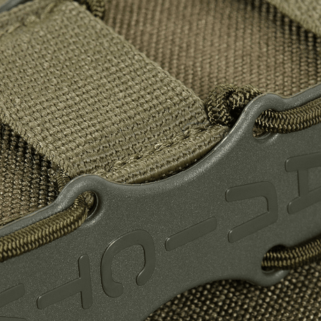 Nærbillede af M-Tac PCC Magasinlomme Kolchan lavet af Cordura 1000D med stødresistente plastikindsatser til sikker opbevaring.