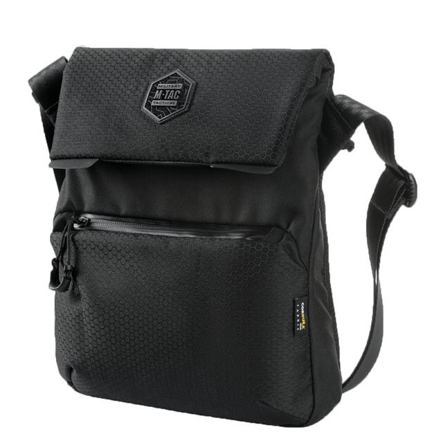 M-Tac Konvert Taske Elite i sort, lavet af holdbart Cordura-materiale med justerbar skulderrem og magnetventil lukning.