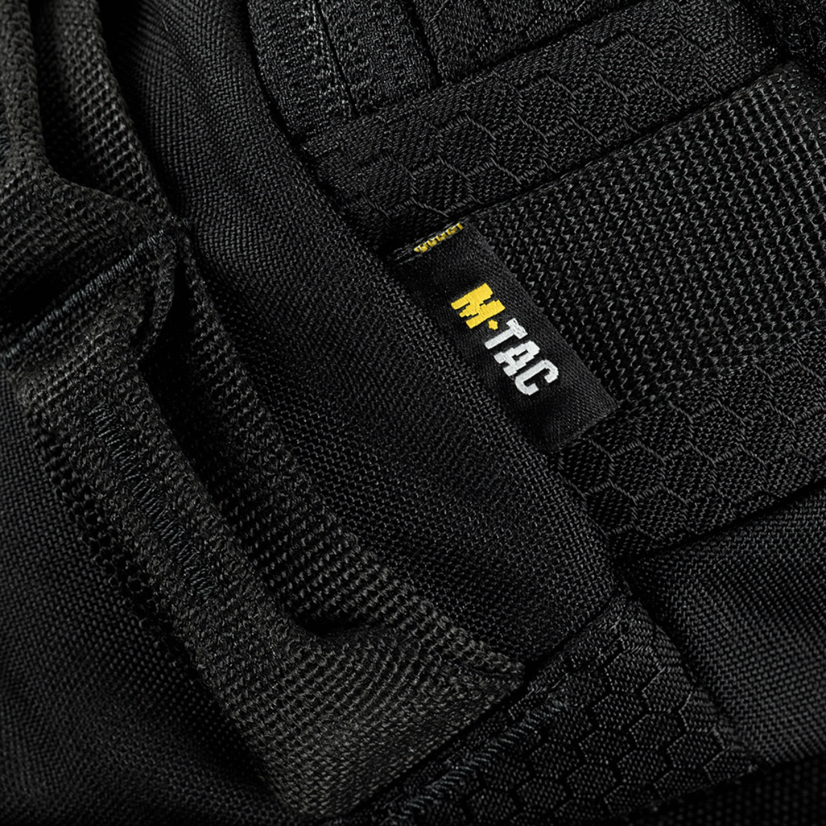 Nærbillede af M‑Tac Bæltetaske Elite Hex med Cordura materiale og M-Tac logo