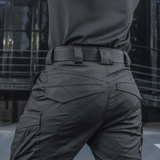 M-Tac Taktisk Bælte med Cobra-spænde i sort nylon, bæres af en person iført taktiske bukser, ideel til militære og aktive brugere.