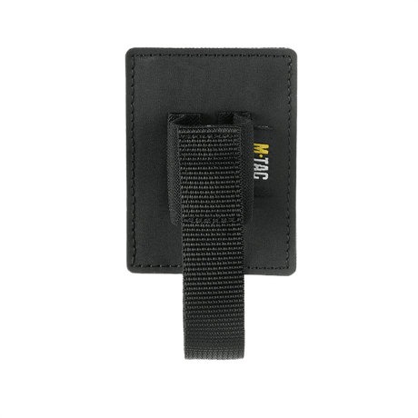 M‑Tac Modulær Indsats til Pepperspray i sort polymerkomposit med elastikstrop til sikker fastgørelse og hurtig adgang.