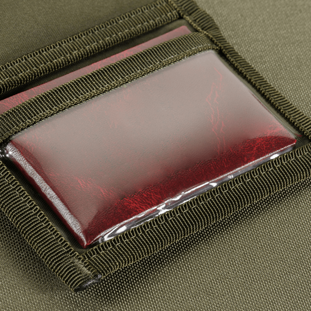 M‑Tac Pung Elite Gen.II Hex med plastiklomme til dokumenter i slidstærkt Cordura Hex 1000D materiale.