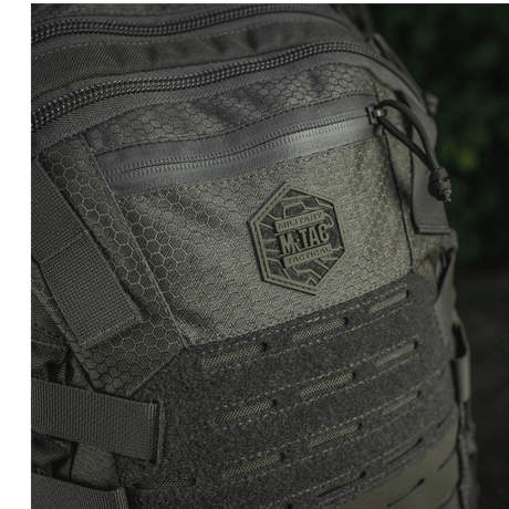 M-Tac Mission Rygsæk Elite Hex med Cordura materiale, ergonomisk design og MOLLE LASER CUT-system, perfekt til holdbarhed og funktionalitet.